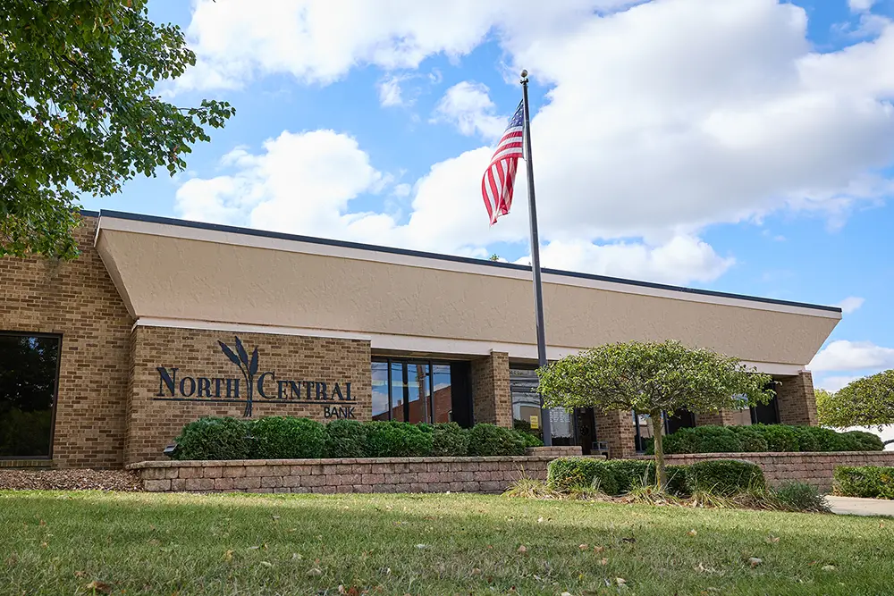 A brick building with the North Central Bank logo on it